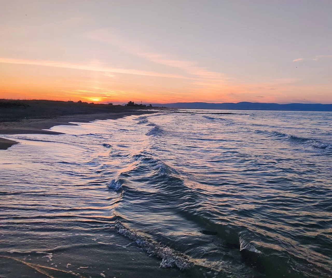 Costa e mare di Zapponeta al tramonto